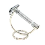 Double edge safety razor resting on the Parker curved chrome razor stand