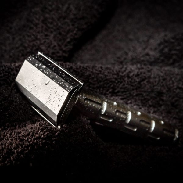The Goodfellas' Smile Syntesi Safety Razor – Stainless Steel Three-Piece head up on towel