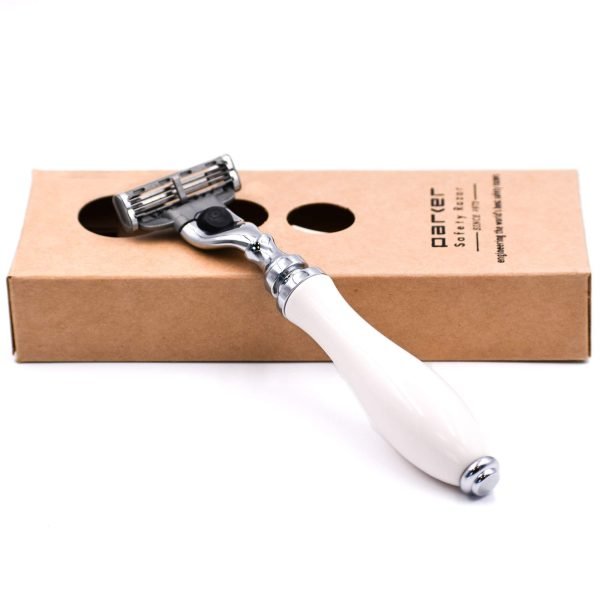 Parker 111W-M3 White Resin Handle Mach 3 Razor resting on box