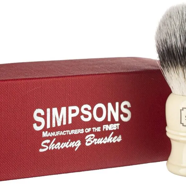 Simpsons Trafalgar T1 shaving brush with a cream Alexander Simpson handle and banded knot, beside its red Simpsons box
