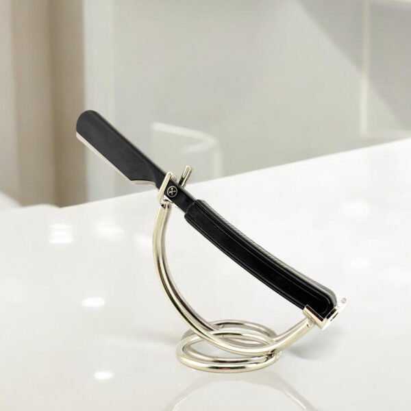 Parker Director barber razor placed on countertop beside grooming tools black