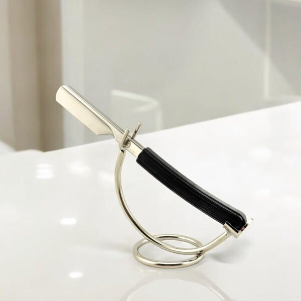Parker Director barber razor placed on countertop beside grooming tools chrome