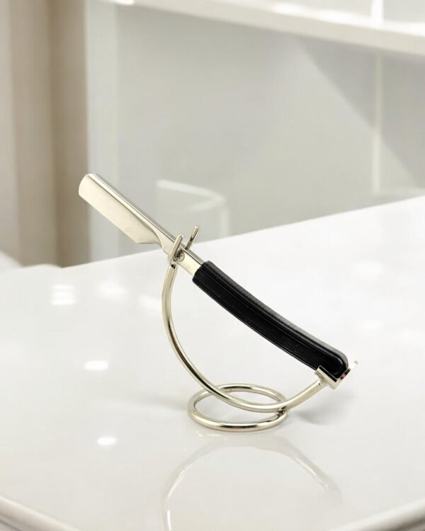 Parker Director barber razor placed on countertop beside grooming tools chrome