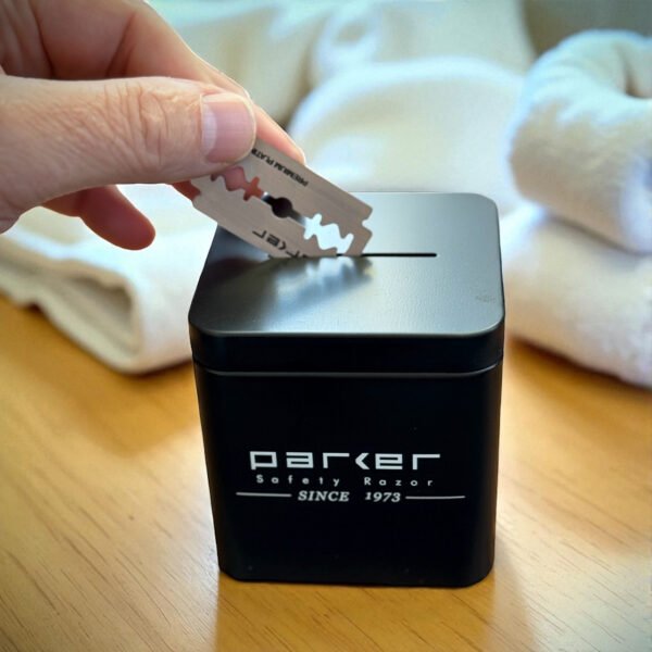 Parker blade disposal bank holding up to 300 used razor blades with box on counter