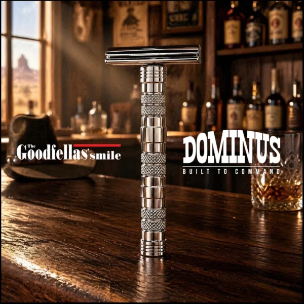 Dominus safety razor shown upright in The Goodfellas' Smile branded artwork