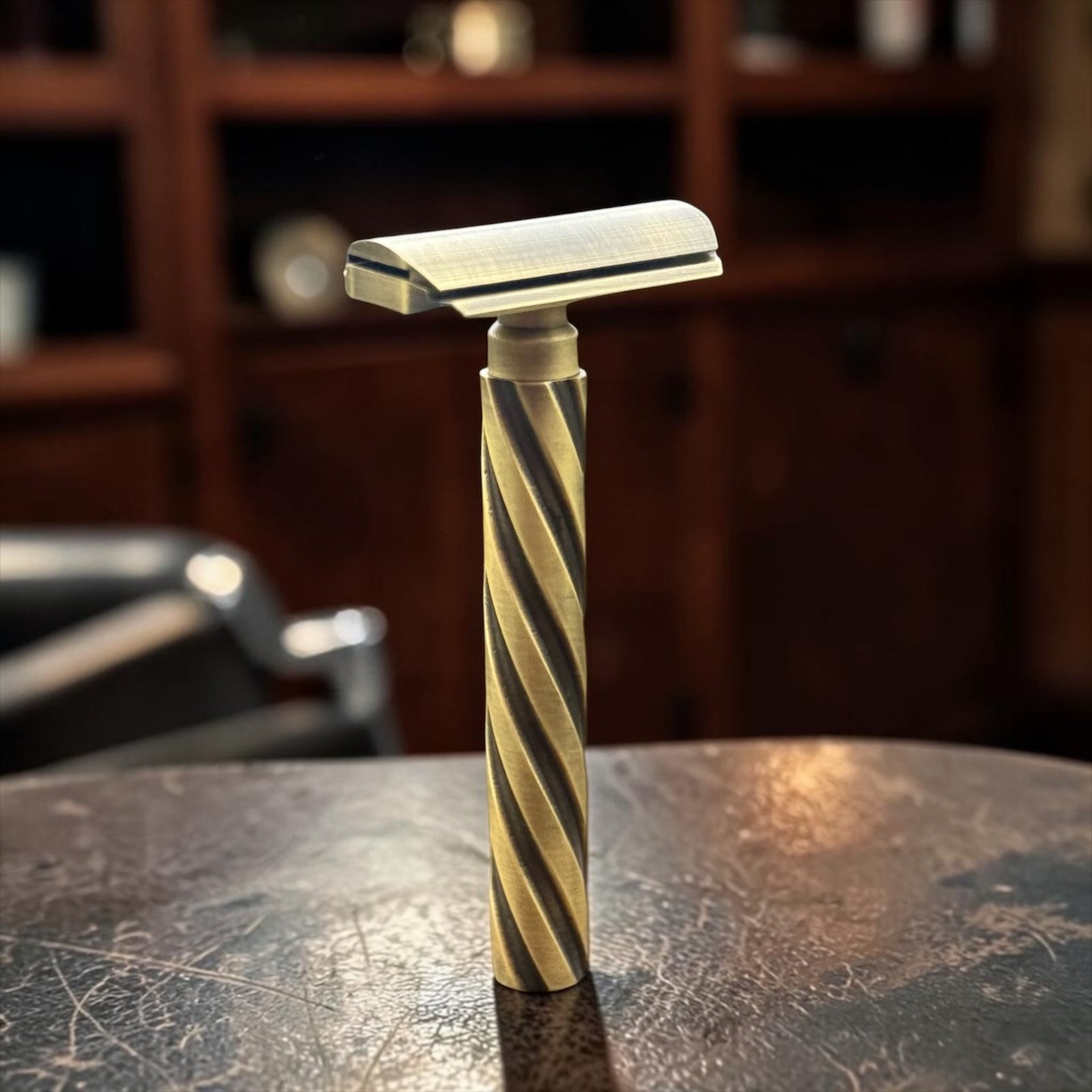 Parker Flight brass safety razor standing upright showing the spiral-pattern grip
