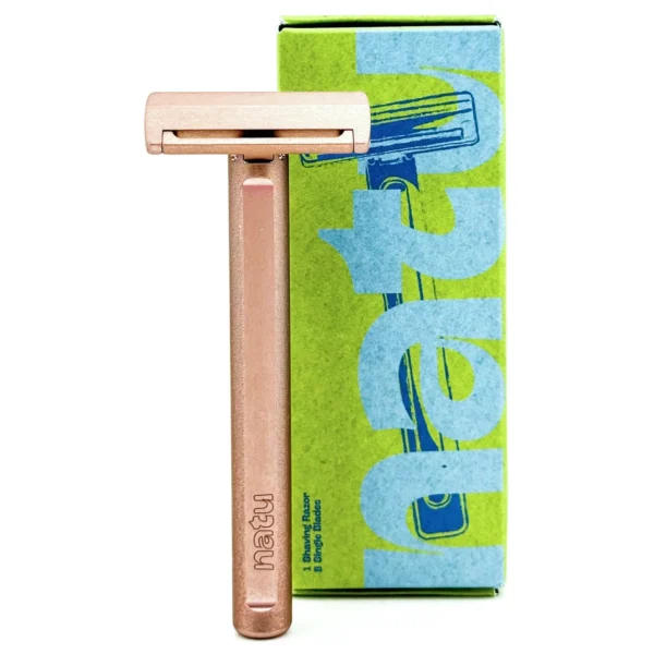 NATU single edge pivot head safety razor with a rose toned copper anodised aluminium handle, shown with its retail box