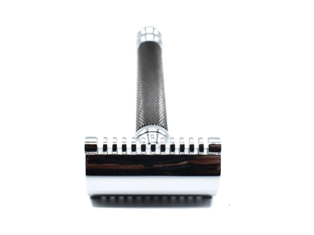 Open comb double edge safety razor on a white background