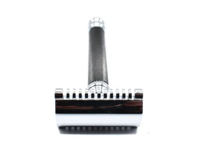 Open comb double edge safety razor on a white background