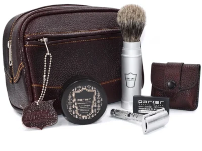Parker deluxe travel shave kit with safety razor, brush and leather case laid out for packing