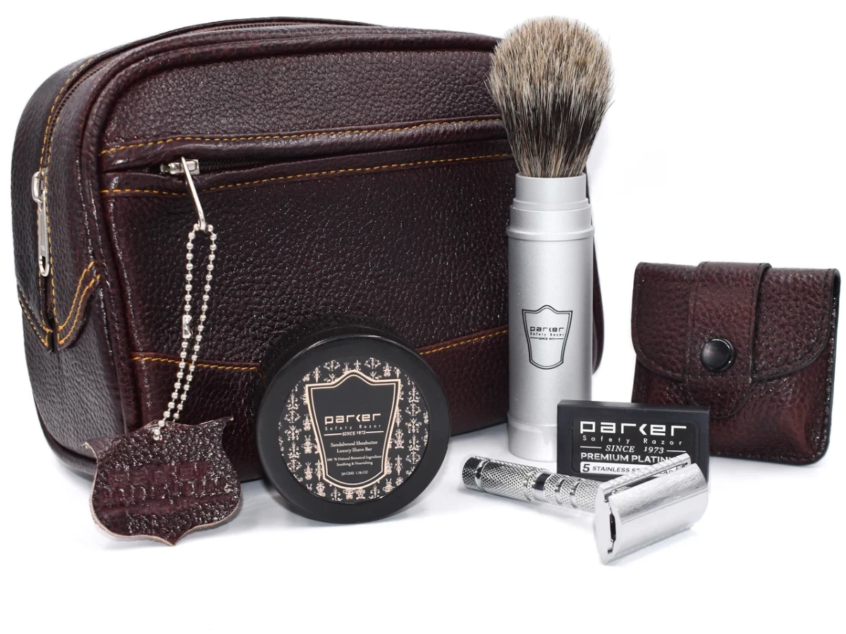 Parker deluxe travel shave kit with safety razor, brush and leather case laid out for packing