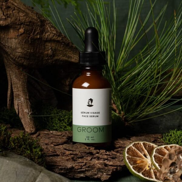 GROOM Face Serum 30 ml shown with pine and dried reishi