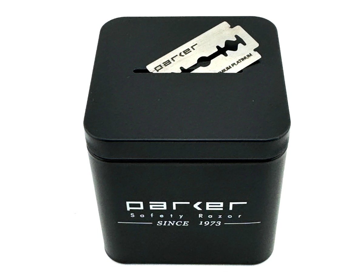 Parker all metal double edge blade disposal bank with a used razor blade in the slot